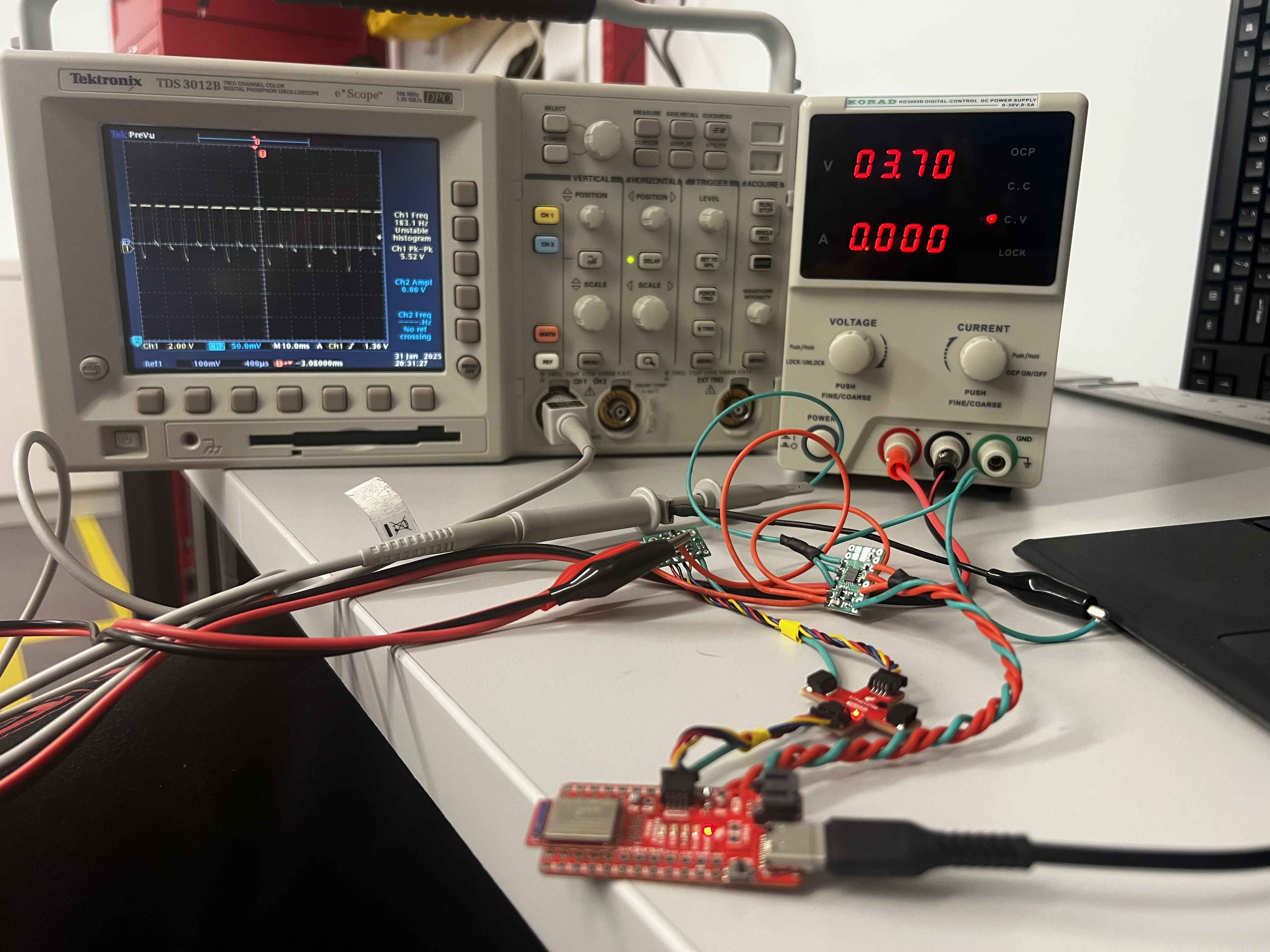 Setup with power supply and oscilloscope